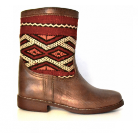Leather boot and kilim