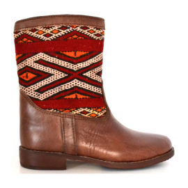 Leather boot and kilim