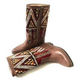 Leather boot and kilim