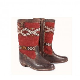 Leather boot and kilim