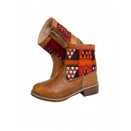 Mini bottes en vrai cuir...